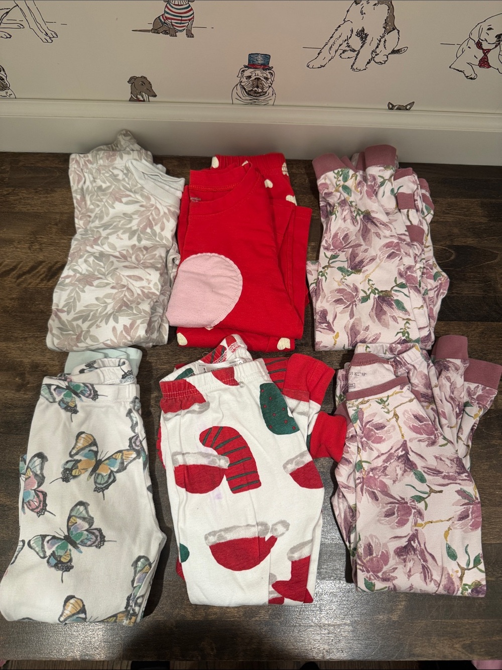 6 pairs of pajamas. Size 5T. Majority Burt's Bees Baby and Carters.